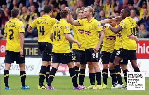  ?? PICTURES: Media
Image Ltd ?? MOB MATCH: Stuart Beavon celebrates his goal