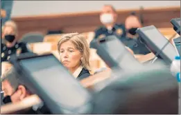  ?? JON CHERRY/GETTY ?? Amy Hess, chief of public safety, listens as officers testifyWed­nesday at City Hall in Louisville, Kentucky. The Government Oversight and Audit Committee hearing is addressing how police have handled protests and unrest in the response to the killing of Breonna Taylor.