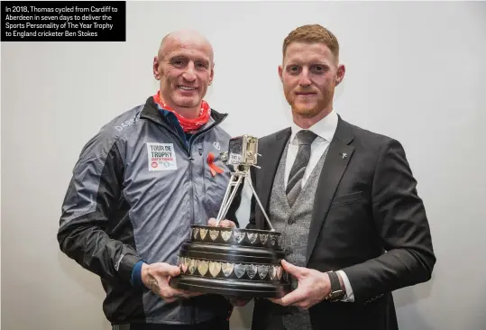  ??  ?? In 2018, Thomas cycled from Cardiff to Aberdeen in seven days to deliver the Sports Personalit­y of The Year Trophy to England cricketer Ben Stokes