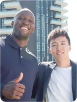  ?? ?? Inter Milan striker Romelu Lukaku ( left) and club chairman Steven Zhang pose for a picture on June 29, 2022 in Milan, Italy.