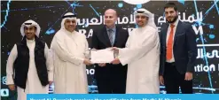  ??  ?? Yousef Al-Ruwaieh receives the certificat­es from Madhi Al-Khamis.