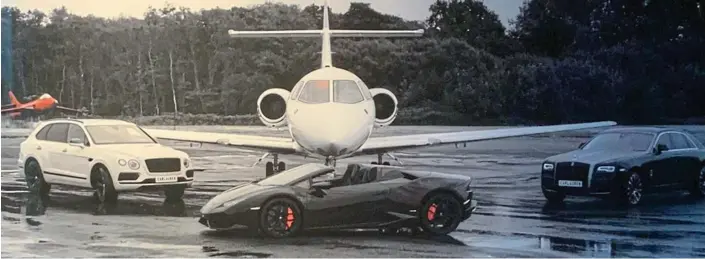  ?? ?? Morning raids: Among the assets seized by the Serious Fraud Office were a Hawker private jet, a Bentley SUV, far left, a Lamborghin­i and a Rolls-Royce Ghost