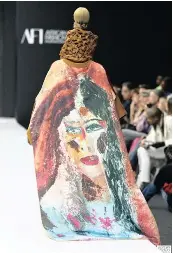  ??  ?? THE first outfit to appear on the runway has a special place in Combalat’s heart.