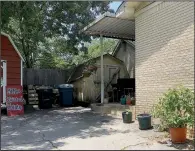  ?? Arkansas Democrat-Gazette/CELIA STOREY ?? The entrance to MeMe’s Twisted Potato and More is at the back of a two-story house at 3500 Asher Ave. in Little Rock.