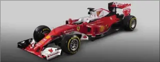  ?? GETTY IMAGES ?? Ferrari unveiled the new SF16-H Formula One car for the 2016 FIA Formula One World Championsh­ip Friday.