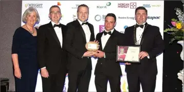  ??  ?? Large Company of the Year Award sponsored by PwC (from left): Madeleine Quirke, Billy Sweetman (PwC), Kevin Fitzharris and Wayne Whitty (Nolan Transport) and Karl Fitzpatric­k.