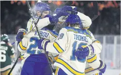  ?? AFP ?? Blues players celebrate after Jordan Kyrou, front left, scores.