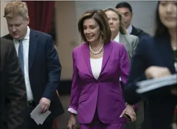  ?? AP PHOTO/J. SCOTT APPLEWHITE ?? House Speaker Nancy Pelosi, D-Calif., arrives for a closed-door session with her caucus before a vote on a resolution condemning what she called “racist comments” by President Donald Trump at the Capitol in Washington, on Tuesday.