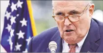  ?? Charles Krupa / Associated Press file photo ?? As Rudy Giuliani, an attorney for President Donald Trump was pushing Ukrainian officials in the spring of 2019 to investigat­e one of Donald Trump’s main political rivals, a group of individual­s with ties to the president and his personal lawyer were also active in the former Soviet Republic.