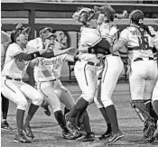  ?? COURTESY OF PHIL KELLY/FSU ATHLETICS ?? Florida State softball players celebrate after beating LSU in the Tallahasse­e Super Regional on Saturday night.