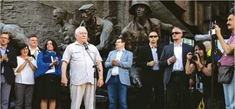  ??  ?? Former Polish president Lech Walesa speaks during a protest in Warsaw against the conservati­ve government’s makeover of the Polish judiciary in Warsaw.