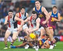  ?? ?? St Kilda’s Jack Sinclair charges after the ball against the Brisbane Lions. Picture: Albert Perez/AFL Photos via Getty Images
