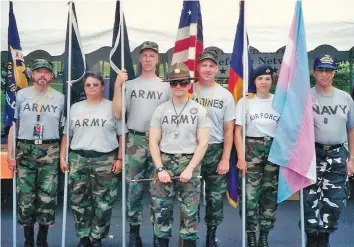  ??  ?? Atlanta transgende­r activist Monica Helms (far right) founded the Transgende­r American Veterans Associatio­n in 2003. (Courtesy photo)