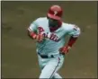  ?? JOHN MINCHILLO — THE ASSOCIATED PRESS ?? Philadelph­ia Phillies’ Cesar Hernandez runs the bases after hitting a solo home run in the first inning.