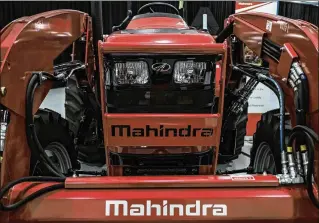  ??  ?? A Mahindra tractor is displayed at an event announcing the company’s plans for an assembly plant in Auburn Hills, Mich. The company will begin producing vehicles at the Detroit-area plant early next year.