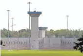  ?? REINHOLD MATAY, AP ?? Prison perimeter towers are unstaffed in Coleman, Fla., as well.