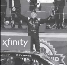  ?? Associated Press ?? Ty Gibbs celebrates after winning the NASCAR Xfinity Series race and the season championsh­ip on Nov. 5 in Avondale, Ariz. Gibbs was promoted to the Cup Series on Tuesday.