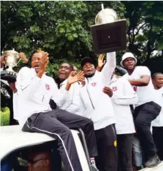  ?? ?? Chegutu Pirates players parading the trophies they won at the end of the season last year in Chegutu on Friday