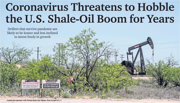  ?? AFP ?? A pump jack operates in the Permian Basin near Odessa, Texas on April 24.