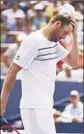  ?? John G. Mabanglo EPA ?? MARDY FISH knew he wasn’t going to go out with a bang at U.S. Open.