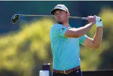  ?? RYAN KANG/ASSOCIATED PRESS ?? Sam Burns, shown teeing off on the ninth hole at Riviera Country Club on Friday, stands at 12-under 130 through two rounds in the tournament.