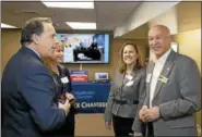  ?? COURTESY DE KINE PHOTO LLC ?? The Middlesex Chamber recently hosted an open house for new members where over 60 guests networked and learned about the benefits of chamber membership. From left, new members Guy Tommasi and Wendy Shumway and Middlesex Chamber Ambassador Program...