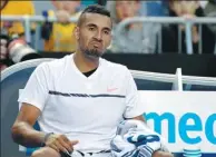  ?? AARON FAVILA / AP ?? Nick Kyrgios reacts after his second-round loss to Andreas Seppi at the Australian Open on Wednesday.