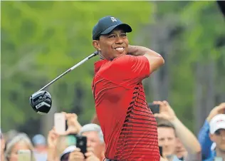  ?? Picture: AFP ?? ALL IN PLAIN SIGHT: Tiger Woods plays his shot from the 14th tee during the final round of the Valspar Championsh­ip. After a long absence the American seems on his way back to his best