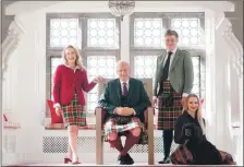  ?? ?? John Michael BaillieHam­ilton Buchanan, the new Chief of Clan Buchanan, with his family.