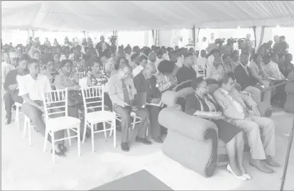  ??  ?? Minister of Public Health Volda Lawrence along with Prime Minister Moses Nagamootoo (sitting in front) at the commission­ing of the bond at Kingston yesterday afternoon.