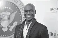  ?? AP FILE PHOTO ?? Actor Lance Reddick appears at the “White House Down” premiere in New York in 2013. Reddick was a character actor who specialize­d in intense, icy and possibly sinister authority figures on TV and film. He died suddenly on Friday. He was 60.