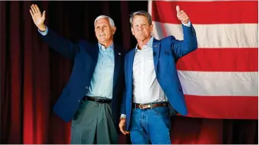  ?? JOE RAEDLE/GETTY IMAGES/TNS ?? Mike Pence, who was Donald Trump’s vice president and former loyal No. 2, stands up Monday for Georgia Gov. Brian Kemp, Trump’s nemesis, at an election-eve campaign event in Kennesaw.