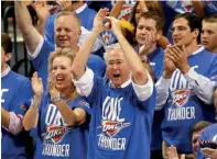  ??  ?? In his usual front-row seat at an OklahomaCi­ty Thunder game in 2012