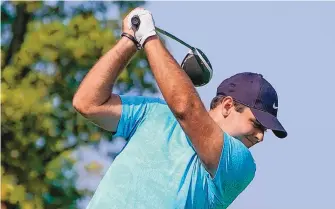  ?? CHARLES KRUPA/ASSOCIATED PRESS ?? Patrick Reed, shown at the 14th tee on Friday, shot an even-par 70 that helped him emerge with a oneshot lead following two rounds of the U.S. Open. Only a dozen players shot par or better on Friday.