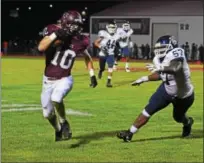  ?? AUSTIN HERTZOG - DIGITAL FIRST MEDIA ?? Pottsgrove’s Bailey Delp (10) returns an intercepti­on deep into Pottstown territory during the first quarter Friday.