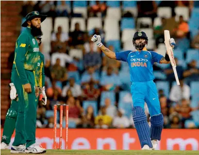  ?? AFP ?? Virat Kohli celebrates his century against South Africa during the sixth ODI at the Super Sport Park in Centurion on Friday. —