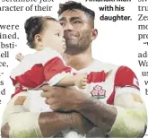  ??  ?? 0 The Japan team bid farewell at the final whistle. Below, a tearful Amanaki Mafi with his daughter.