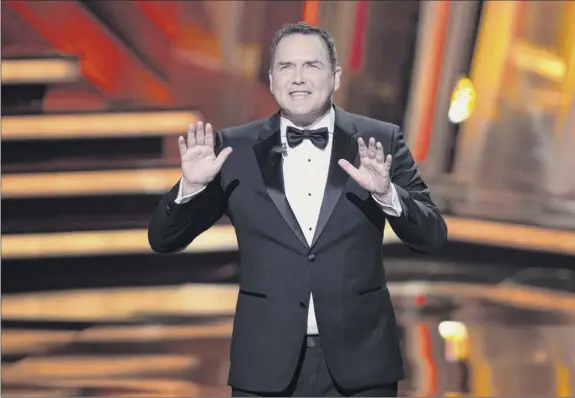  ?? Peter Power / The Canadian Press via AP ?? In this March 13, 2016, file photo, Norm Macdonald hosts the Canadian Screen Awards in Toronto. “The Tonight Show” canceled an appearance by Macdonald after he made comments about the #Metoo movement and fellow comedians Louis C.K. and Roseanne Barr.