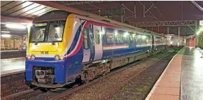  ?? ?? Crewe on a wet evening found two-car No. 175010 awaiting its next turn, possibly to Chester. The Class 175s are gangwayed with the set. Photograph­ed on December 3, 2004.