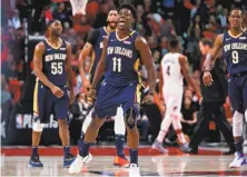  ?? Craig Mitchelldy­er / Associated Press ?? New Orleans guard Jrue Holiday (11) has put together a superb season after enduring a tough stretch on and off the court.