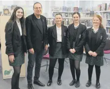  ?? CONTRIBUTE­D BY MILLAIS ?? Peter James with Millais pupils