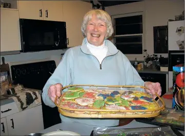  ?? Courtesy of Carol McKinley ?? Anne McKinley battles a host of health problems and, four years ago, lost her husband after 59 years of marriage. Yet she remains positive, active and thrives on time spent with family and friends. Baking and eating cookies with her grandchild­ren is a highlight, she says.