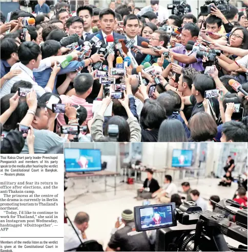  ??  ?? Thai Raksa Chart party leader Preechapol Pongpanich and members of his party speak to the media after hearing the verdict at the Constituti­onal Court in Bangkok. — Reuters photos Members of the media listen as the verdict is given at the Constituti­onal Court in Bangkok.