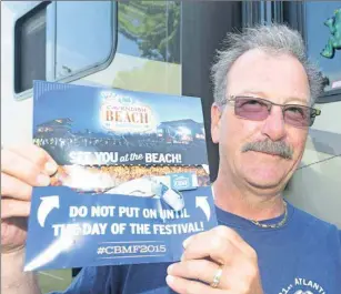  ?? HEATHER TAWEEL/THE GUARDIAN ?? Dennis Landry has travelled from Newfoundla­nd to take in the Cavendish Beach Music Festival this weekend. For his second year coming, he will be sitting in the VIP Hay Loft beside the stage to take in the show.