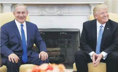  ?? CAROLYN KASTER / THE ASSOCIATED PRESS ?? The mood was less than jovial when Israeli Prime Minister Benjamin Netanyahu met with Barack Obama in the Oval Office in May 2011, at top. But Netanyahu was all smiles with current president Donald Trump on Wednesday.