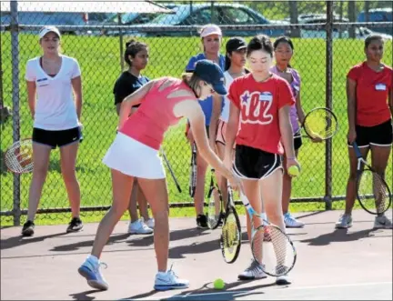  ?? GENE WALSH — DIGITAL FIRST MEDIA ?? North Penn High School tennis coach Kristina Maxwell is back for her second season with the Maidens.