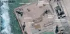  ??  ?? A satellite image shows constructi­on of possible radar tower facilities in the Spratly Islands in the disputed South China Sea (Reuters)