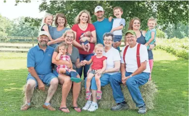  ?? DAVID NEVALA ?? Three generation­s of Campbells run the family's organic farm in Iowa County.