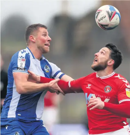  ?? Picture: Steven Paston/PA ?? Rovers defender Alfie Kilgour battles for the ball with Charlton’s Conor Washington