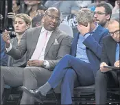  ?? JOSE CARLOS FAJARDO — STAFF PHOTOGRAPH­ER ?? Warriors coach Steve Kerr lowers his head as assistant Mike Brown speaks to him on the bench during Game 4.